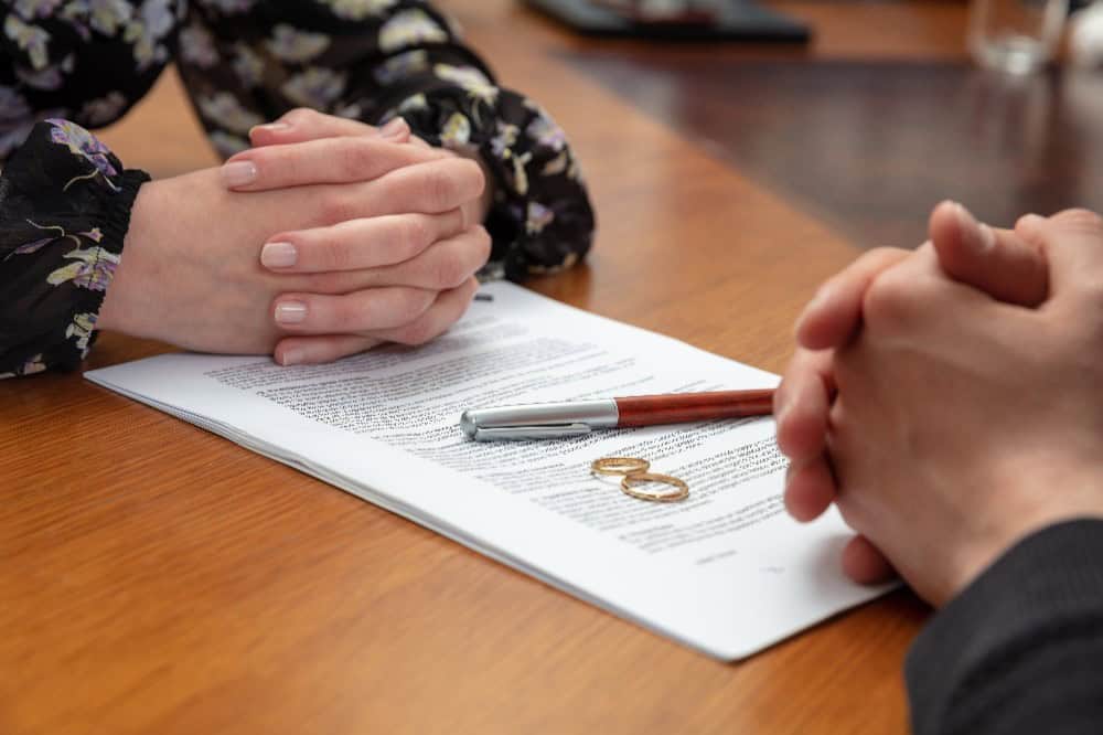 couple with prenup agreement before divorce mediation NYC